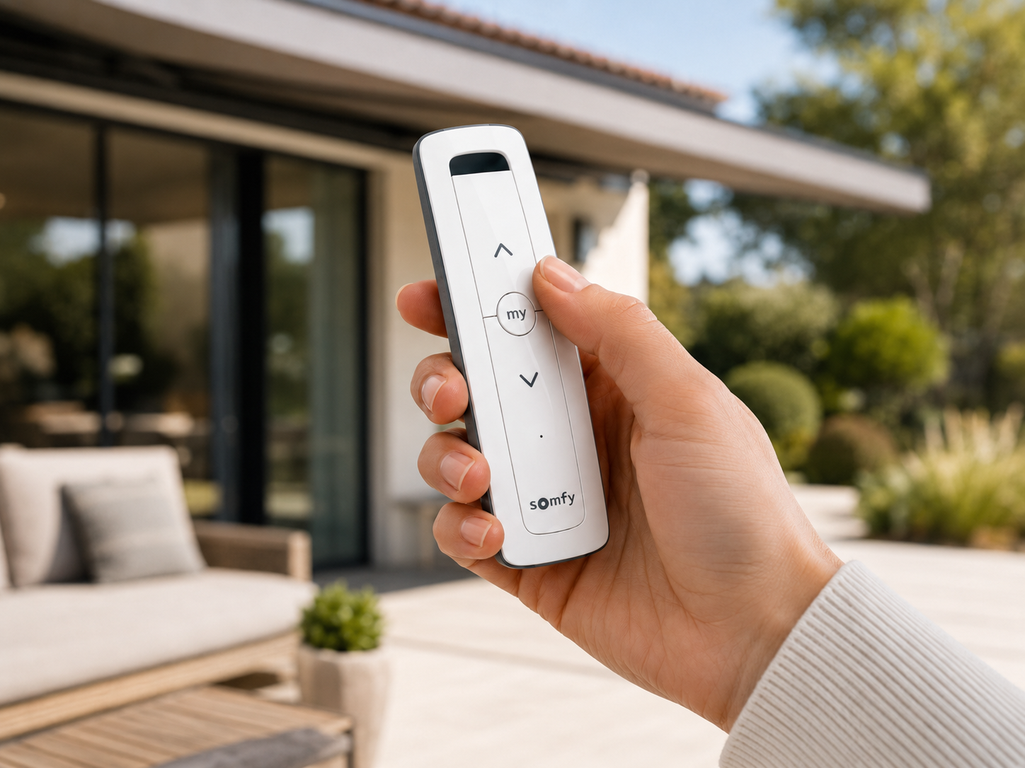 Somfy handheld remote and awning motorization detail