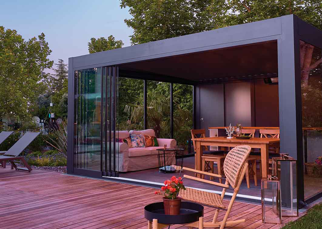 Integrated LED lighting and ceiling fan in louvered pergola