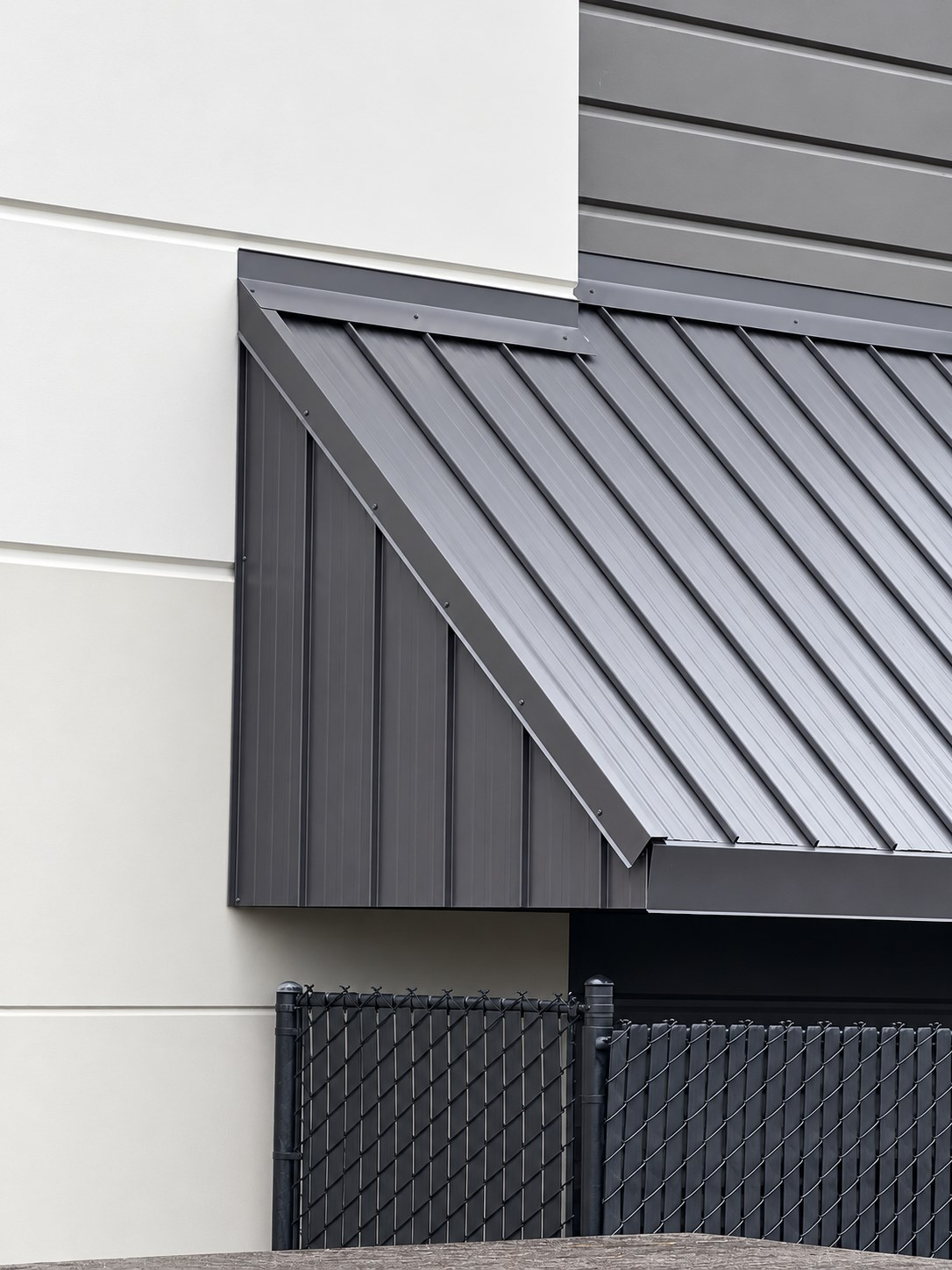 Commercial metal awning fabricated and installed by Rainier Shade